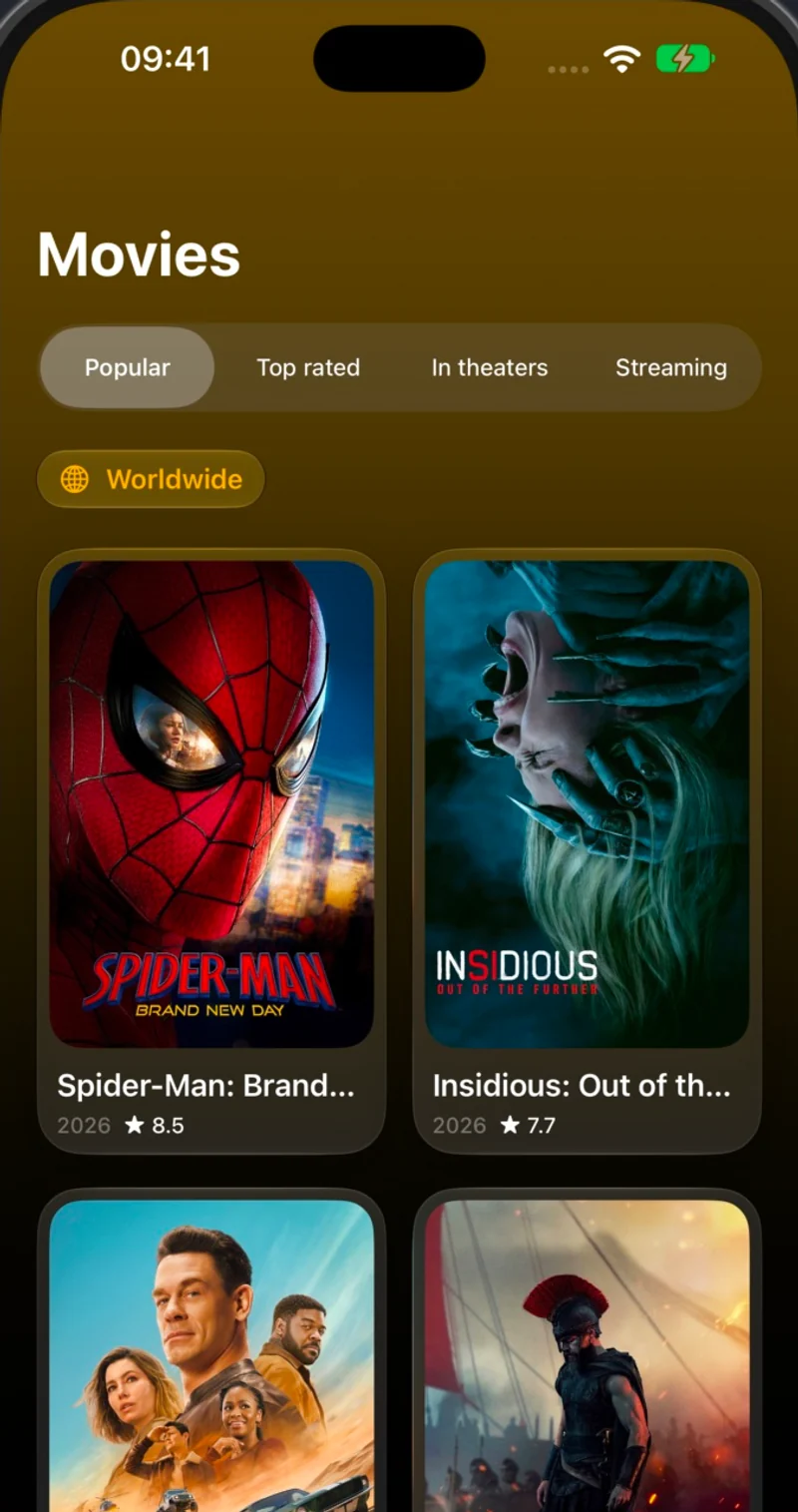 Entlo Movies tab with the Yellow gradient in dark mode